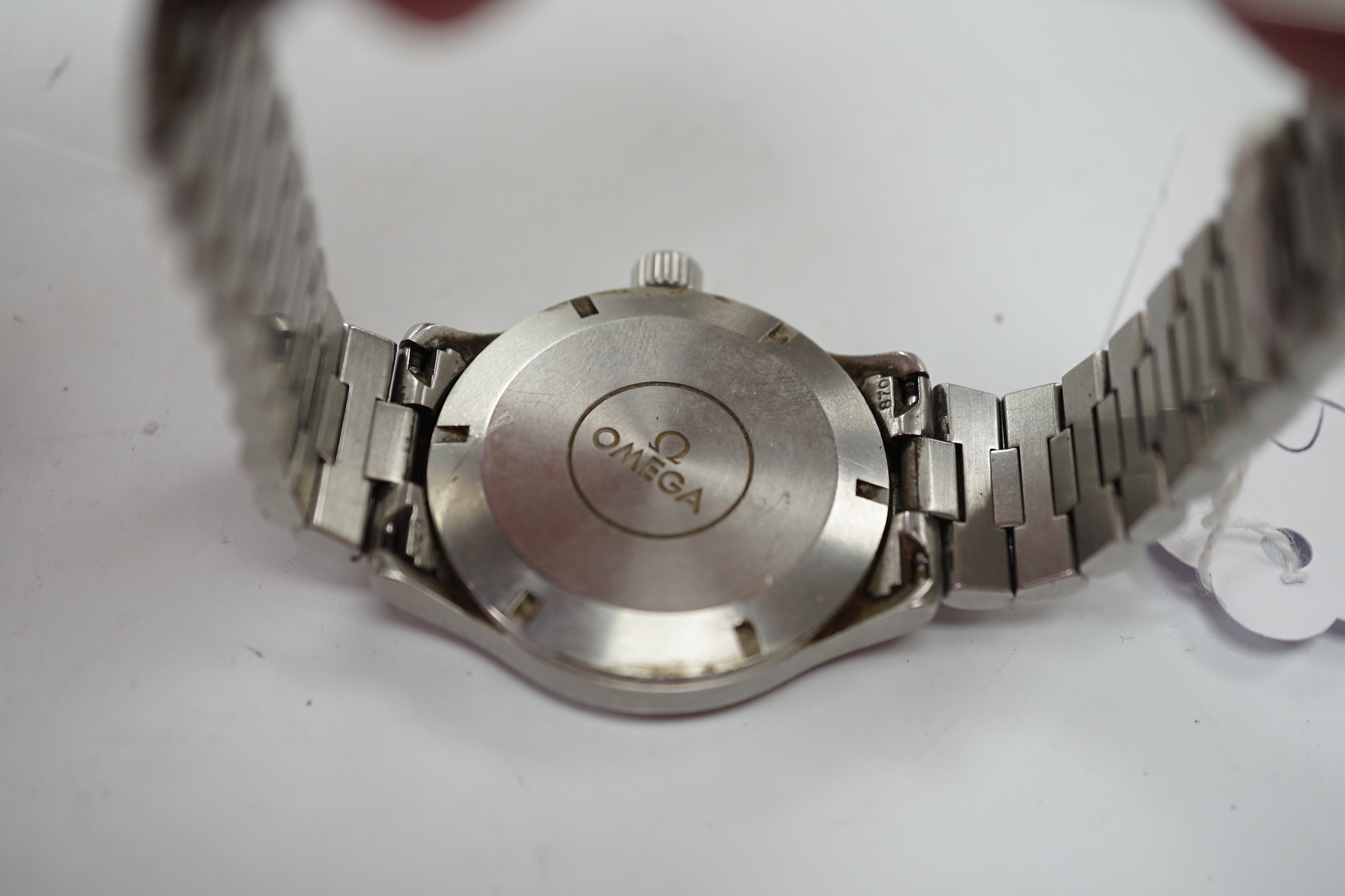 A gentleman's stainless steel Omega Dynamic automatic wrist watch, with black dial and date aperture, on a stainless steel bracelet, no box or papers, case diameter 37mm.